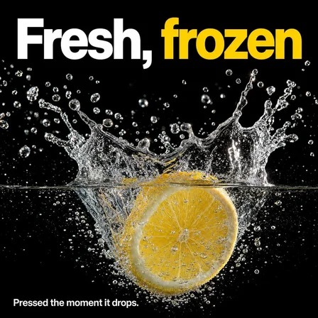 Motion, frozen: an example ad photograph from the product's inspiration library, illustrating the "A splash, a pour or a drop held still mid-air." technique